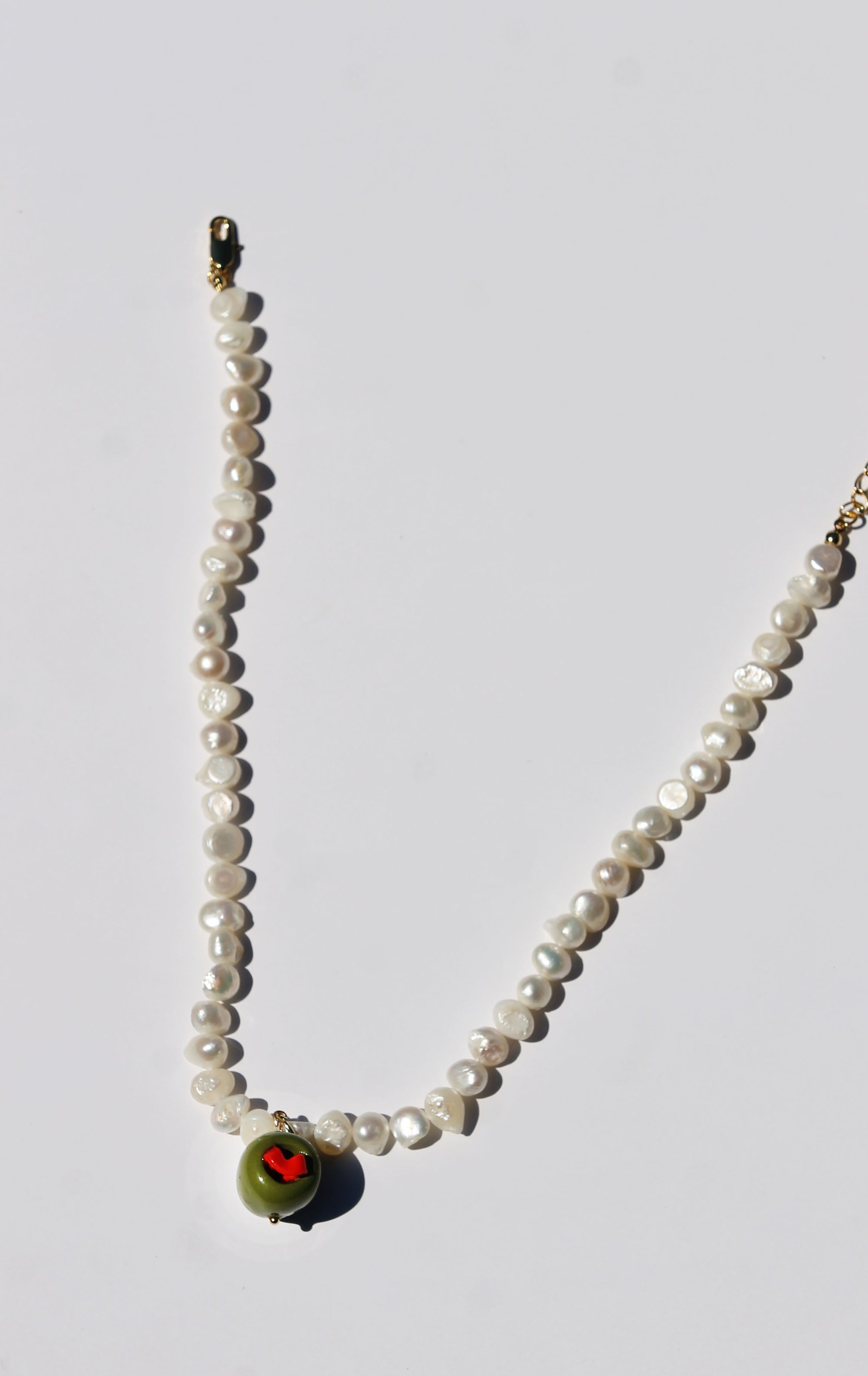olive pearl necklace